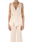 Kocca blusa con bottone gioiello