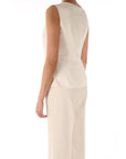 Kocca blusa con bottone gioiello