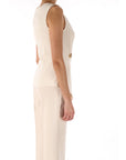 Kocca blusa con bottone gioiello
